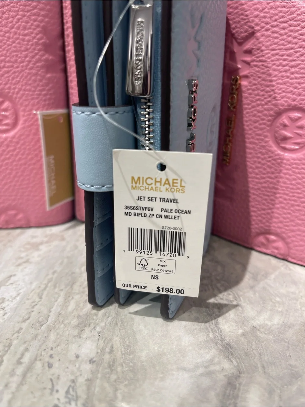Michael Kors Embossed Logo Trifold Wallet - Light Blue
